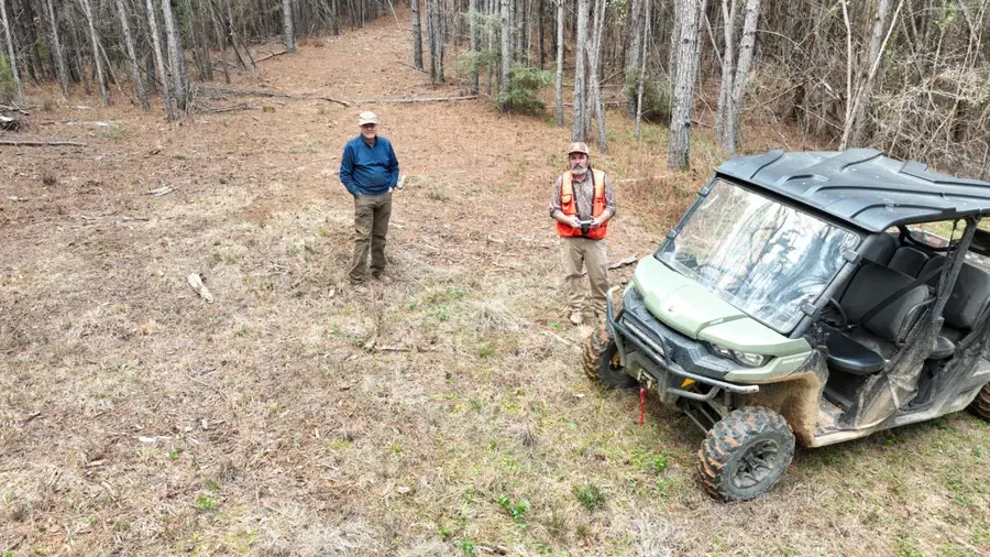 Eric Entrekin with a landowner on a Mississippi pine ridge